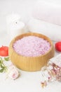 Bath salt with aroma of a rose in a wooden bowl, petals and a fr Royalty Free Stock Photo