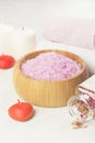 Bath salt with aroma of a rose in a wooden bowl, petals and a fr Royalty Free Stock Photo