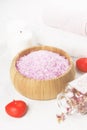 Bath salt with aroma of a rose in a wooden bowl, petals and a fr Royalty Free Stock Photo