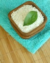 Bath salt in bowl and towel Royalty Free Stock Photo