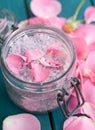 Bath salt and rose leaves Royalty Free Stock Photo