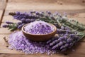 Bath salts herbal body care product with fresh lavender on rustic wooden background Royalty Free Stock Photo