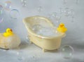 miniature bubble bath and yellow rubber ducks