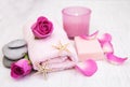 Bath towels, candle and soap with pink roses Royalty Free Stock Photo