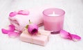 Bath towels, candle and soap with pink roses Royalty Free Stock Photo