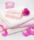 Bath towels and soap with pink roses Royalty Free Stock Photo