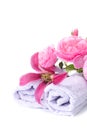 Spa towels with roses on white background Royalty Free Stock Photo