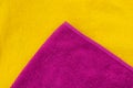 Bath towels yellow and lilac, flat lay. Horizontal photo copy space Royalty Free Stock Photo