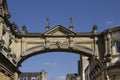 Archway from Roman Baths stretching across the street.