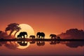 Bathed in the warm colors of dawn, a herd of elephants forms a symphony of silhouettes