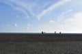 Bathers running on the beach