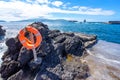 bathing area with round lifebuoy. Pico island in the Azores archipelago.