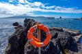 bathing area with round lifebuoy. Pico island in the Azores archipelago.