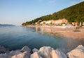 Bathing beach Moscenicka Draga, Croatia, with lots of empty sun loungers, early in the morning Royalty Free Stock Photo