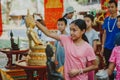 Bathing the Buddha statue in songkran festival