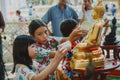 Bathing the Buddha statue in songkran festival