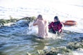 bathing in the hole for baptism, Ukraine, Chernigov.