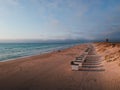 The bathing huts at Blokhus Beach, Denmark during sunset. Royalty Free Stock Photo