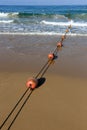 Rope with floats on the seashore