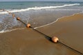 Rope with floats on the seashore