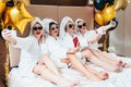 Bathrobe party girls selfie leisure lifestyle Royalty Free Stock Photo