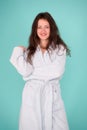 This bathrobe suits her natural beauty. Sensual woman after beauty treatment and wellness therapy. Pretty young woman