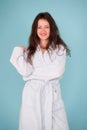 This bathrobe suits her natural beauty. Sensual woman after beauty treatment and wellness therapy. Pretty young woman