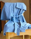 Bathrobes placed on a chair. Royalty Free Stock Photo