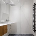Bathroom with black wall heater