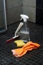 Bathroom cleaning equipment with shower wiper, spray bottle, gloves and a sponge Royalty Free Stock Photo