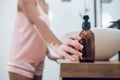 A close up of a woman in pink lingerie in a bathroom Royalty Free Stock Photo