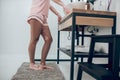 A close up of a woman in pink lingerie in a bathroom Royalty Free Stock Photo