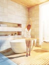 White wood bathroom corner, tub, woman Royalty Free Stock Photo