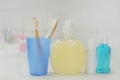 Bathroom with cosmetic soap, liquid rinse in bottles