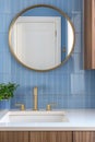 A bathroom detail with blue vertical tiles and gold faucet. Royalty Free Stock Photo