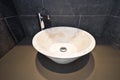 Bathroom detail with round marble wash basin Royalty Free Stock Photo