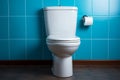 Bathroom elegance white ceramic toilet contrasts beautifully with the soothing blue wall Royalty Free Stock Photo