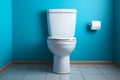 Bathroom elegance white ceramic toilet contrasts beautifully with the soothing blue wall Royalty Free Stock Photo