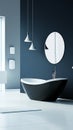 The bathroom features a modern and minimalist design, complete with a curved bathtub, a circular mirror, and soft Royalty Free Stock Photo