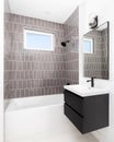 A bathroom with a floating cabinet and subway tile shower. Royalty Free Stock Photo