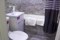 The bathroom has a modern design. In the photo the toilet bath sink