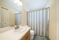 Bathroom interior with bright lighting fixtures and vanity sink Royalty Free Stock Photo