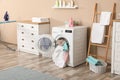 Bathroom interior with towels in washing machine Royalty Free Stock Photo