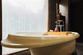 Bathroom interior luxury modern bathroom design with bathtub and a window Royalty Free Stock Photo