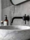 Bathroom interior with stylish black sink and marble washbasin, modern concrete walls Royalty Free Stock Photo