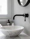 Bathroom interior with stylish black sink and marble washbasin, modern concrete walls Royalty Free Stock Photo