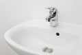 Bathroom interior with white sink and silver faucet Royalty Free Stock Photo