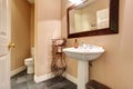 Bathroom interior with white washbasin stand