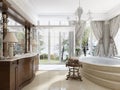 Bathroom in luxury neo-classical style with sinks tubs and a large round bath.