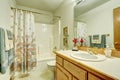 Bathroom in marine style. Shower curtain with sea shells pattern